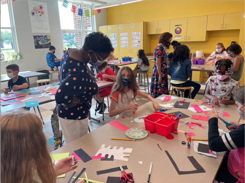 Board of Education Member Janet Maull Martin and Board of Education President Alison Myers visit with students in Ali Selder’s art room. SUBMITTED PHOTO